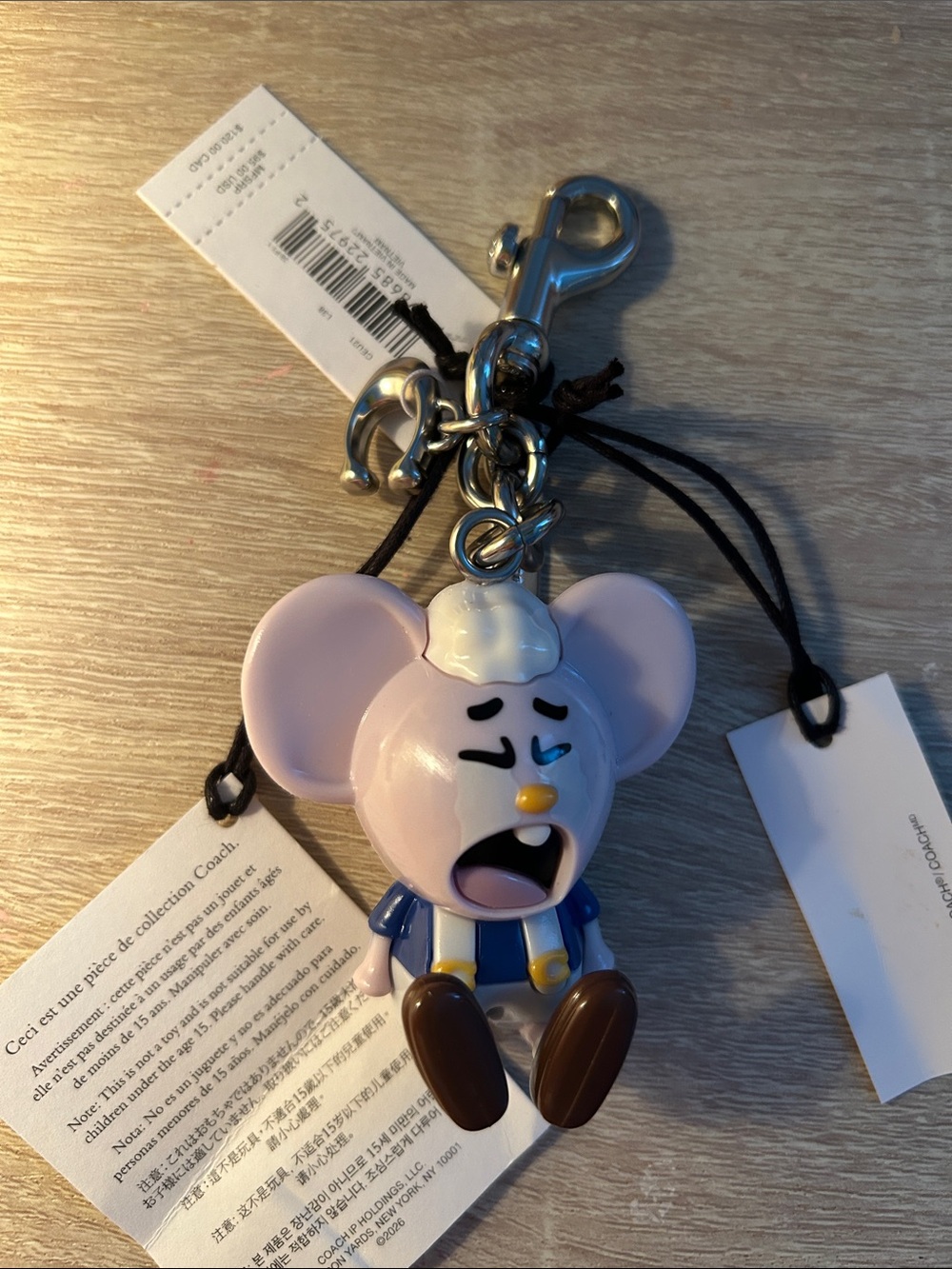 coach brain dead mouse keychain